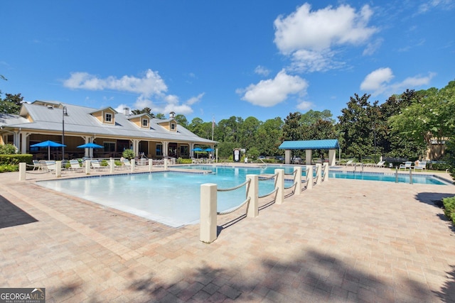 community pool featuring a patio