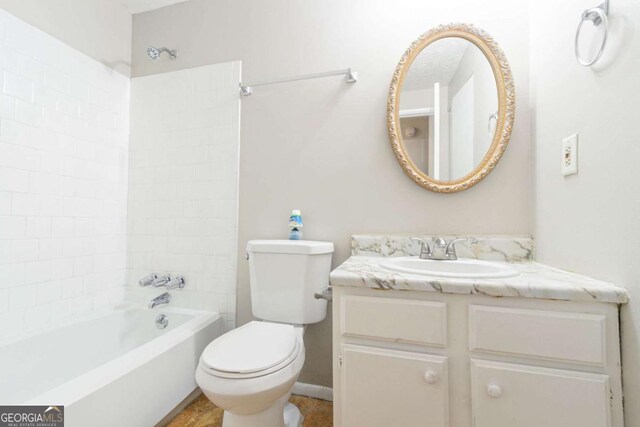 2092 Countydown Ln, Stone Mountain, GA 30088 - full bathroom with bathing tub / shower combination, vanity, and toilet