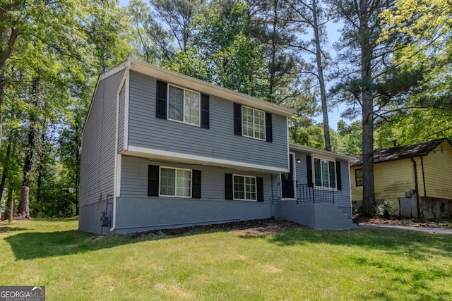 2092 Countydown Ln, Stone Mountain, GA 30088 - tri-level home with a front yard