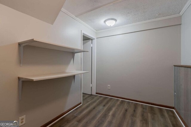 2092 Countydown Ln, Stone Mountain, GA 30088 - interior space with wood finished floors, a textured ceiling, baseboards, and ornamental molding