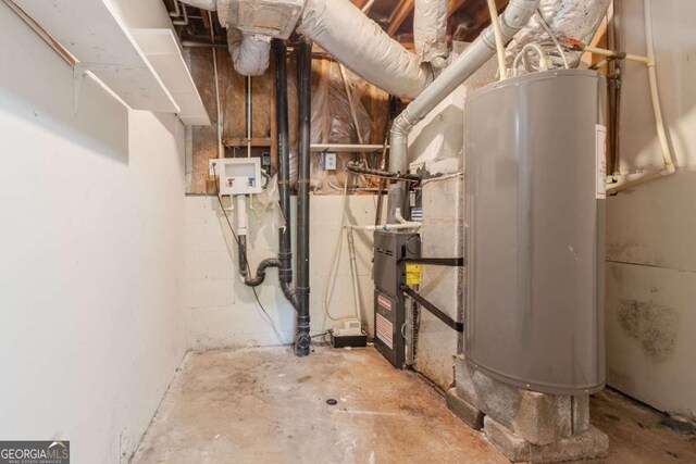 2092 Countydown Ln, Stone Mountain, GA 30088 - utility room featuring electric water heater