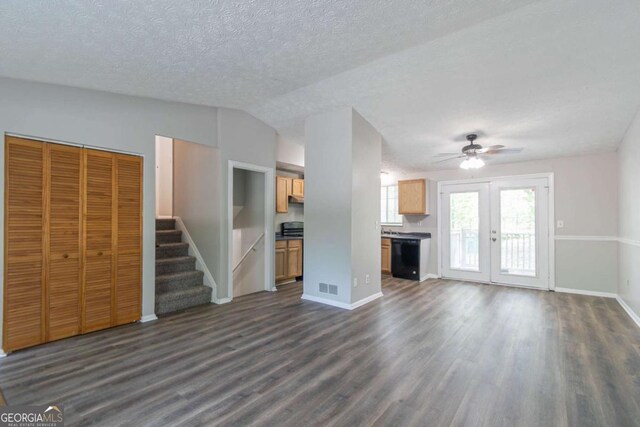 2092 Countydown Ln, Stone Mountain, GA 30088 - unfurnished living room with visible vents, baseboards, and dark wood-style flooring
