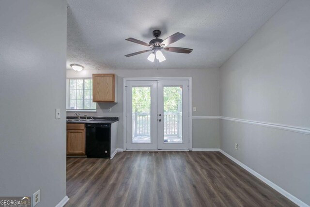 2092 Countydown Ln, Stone Mountain, GA 30088 - kitchen with french doors, a sink, a textured ceiling, black dishwasher, and ceiling fan