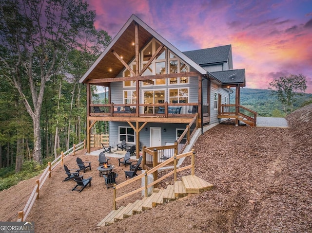 1016 Twisted Oak Rd Unit 115, Talking Rock, GA 30175 - back of house featuring an outdoor fire pit, a wooden deck, stairway, roof with shingles, and a patio area