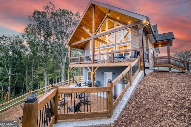 1016 Twisted Oak Rd Unit 115, Talking Rock, GA 30175 - back of house at dusk featuring a wooden deck