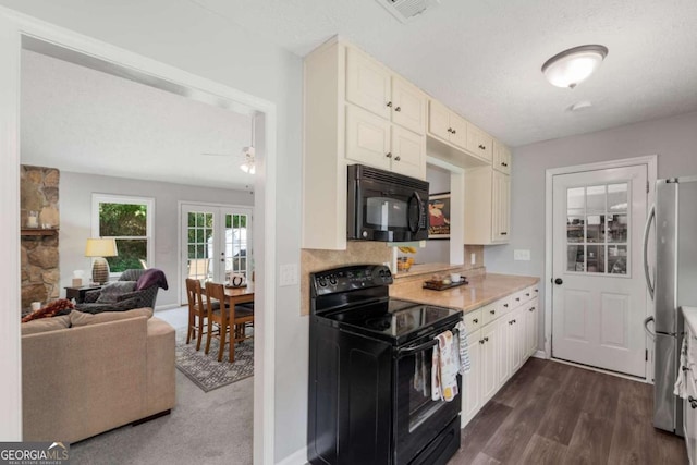 2014 Anchor Way, Buford, GA 30518 - kitchen featuring french doors, dark wood finished floors, open floor plan, light countertops, and black appliances