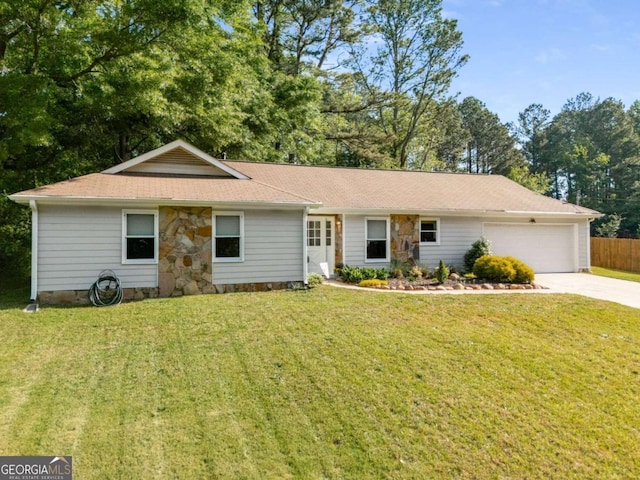 2014 Anchor Way, Buford, GA 30518 - ranch-style house with fence, a shingled roof, a front lawn, concrete driveway, and an attached garage