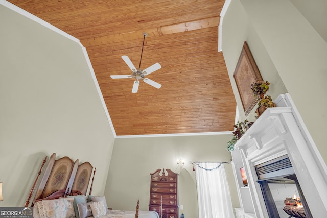 interior space with wood ceiling and ornamental molding