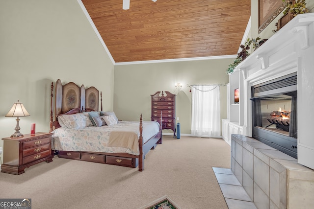 bedroom featuring vaulted ceiling, crown molding, wooden ceiling, and light carpet