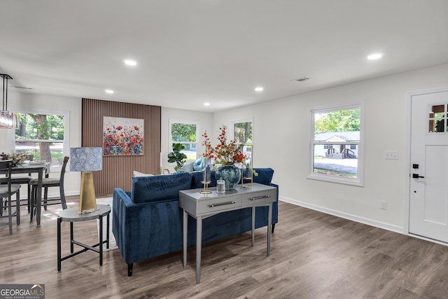 2831 Ivanhoe Ln SE, Smyrna, GA 30082 - living room featuring plenty of natural light, wood finished floors, recessed lighting, and baseboards