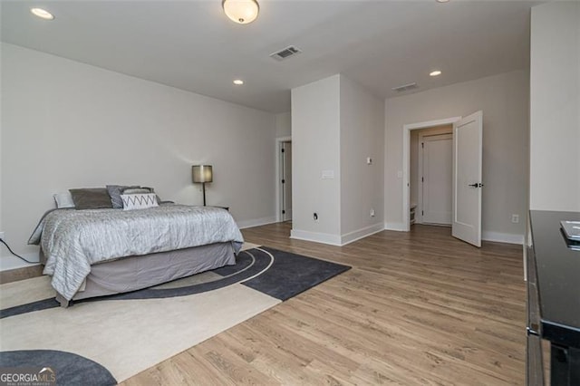 820 Fair View Cir, Roswell, GA 30076 - bedroom featuring wood finished floors, visible vents, and baseboards