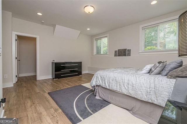 820 Fair View Cir, Roswell, GA 30076 - bedroom with baseboards, wood finished floors, and recessed lighting
