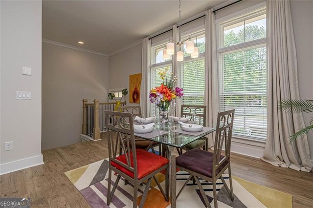 820 Fair View Cir, Roswell, GA 30076 - dining space featuring a wealth of natural light, crown molding, and wood finished floors