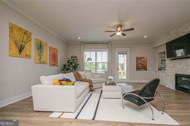 820 Fair View Cir, Roswell, GA 30076 - living room featuring a ceiling fan, baseboards, crown molding, and wood finished floors