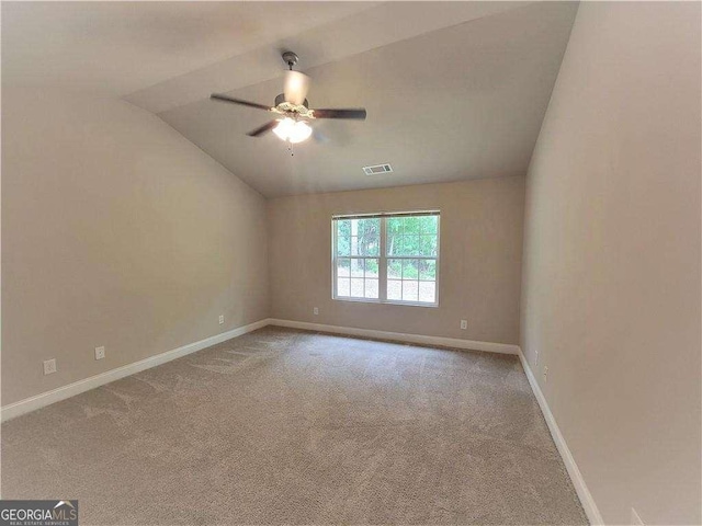 115 Heather Ln, Commerce, GA 30529 - carpeted spare room with lofted ceiling, visible vents, baseboards, and ceiling fan