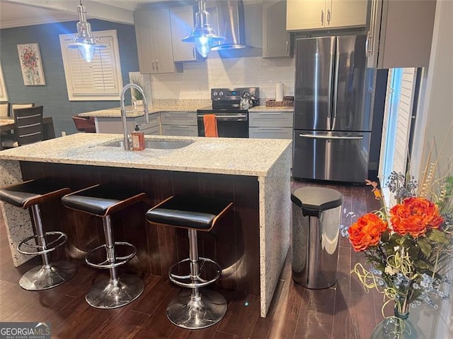 3629 Embry Cir, Atlanta, GA 30341 - kitchen with light stone counters, ornamental molding, black range with electric stovetop, a sink, and freestanding refrigerator