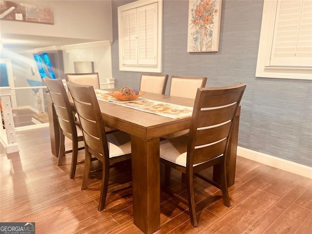 3629 Embry Cir, Atlanta, GA 30341 - dining room with wallpapered walls, wood finished floors, and baseboards