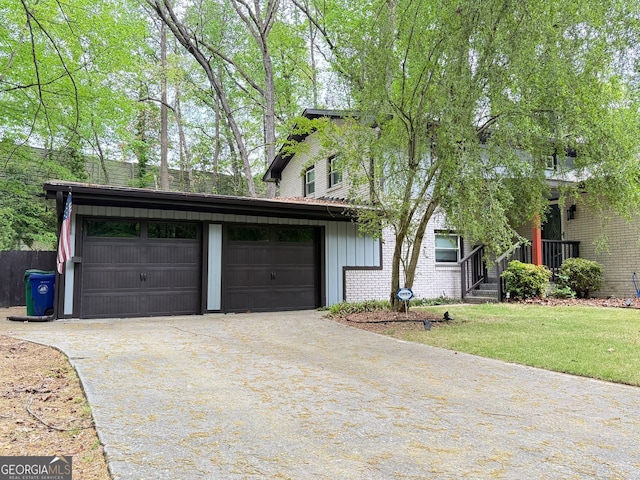 3629 Embry Cir, Atlanta, GA 30341 - view of front of house featuring brick siding, driveway, and a front yard