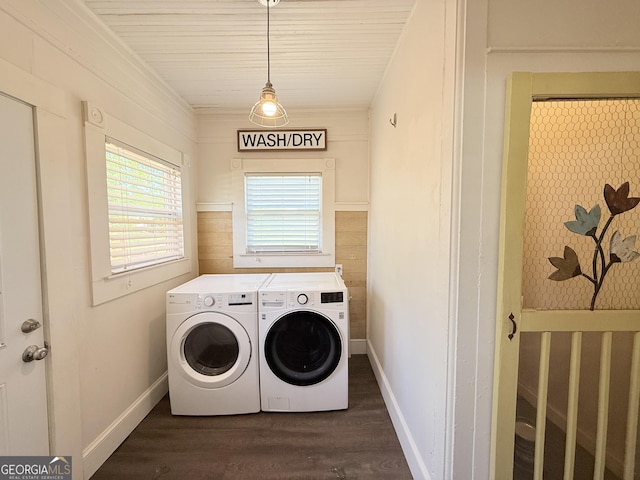 30 Poplar St, Porterdale, GA 30014 - laundry area with dark wood finished floors, washer and dryer, baseboards, and laundry area