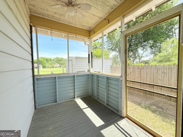 30 Poplar St, Porterdale, GA 30014 - unfurnished sunroom with plenty of natural light and a ceiling fan