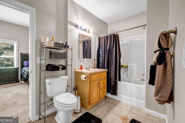 bathroom featuring toilet, tile patterned floors, vanity, and shower / bath combination with curtain