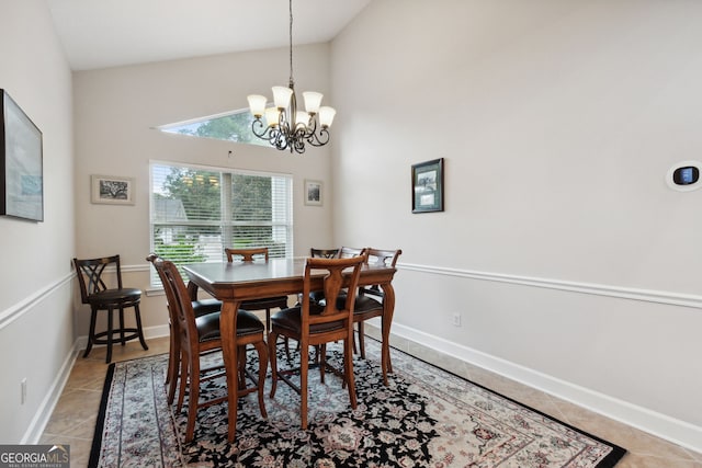 547 E Cardinal Cir, Saint Marys, GA 31558 - dining room featuring an inviting chandelier, baseboards, high vaulted ceiling, and tile patterned floors
