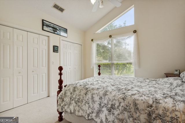 547 E Cardinal Cir, Saint Marys, GA 31558 - carpeted bedroom with high vaulted ceiling, visible vents, multiple closets, and ceiling fan