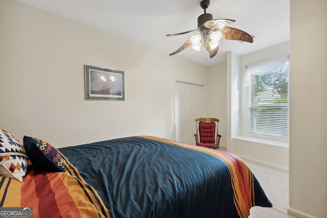 547 E Cardinal Cir, Saint Marys, GA 31558 - carpeted bedroom with baseboards and a ceiling fan