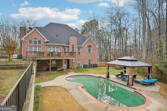 view of pool featuring a gazebo, a patio area, a fenced in pool, and a deck