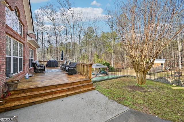 wooden terrace with a gazebo, a swimming pool, a fenced backyard, grilling area, and a yard