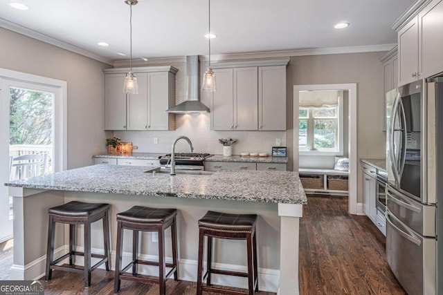 2675 Sugar Mill Dr, Atlanta, GA 30316 - kitchen featuring plenty of natural light, smart refrigerator, gray cabinets, and wall chimney exhaust hood