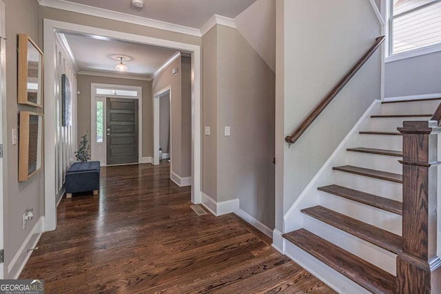 2675 Sugar Mill Dr, Atlanta, GA 30316 - entrance foyer with crown molding, dark wood-style flooring, and plenty of natural light