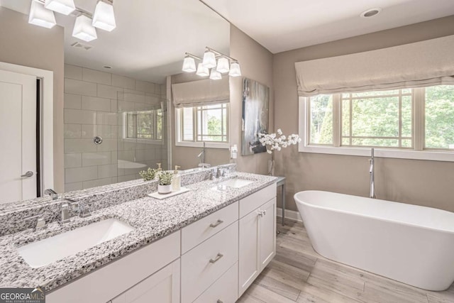 2675 Sugar Mill Dr, Atlanta, GA 30316 - full bath featuring plenty of natural light, a sink, and a tile shower