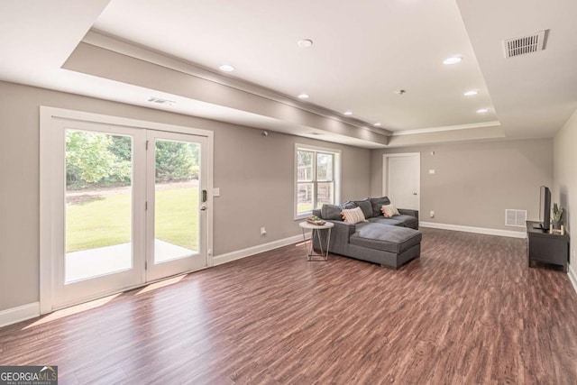2675 Sugar Mill Dr, Atlanta, GA 30316 - living area with plenty of natural light, baseboards, dark wood-type flooring, a tray ceiling, and visible vents