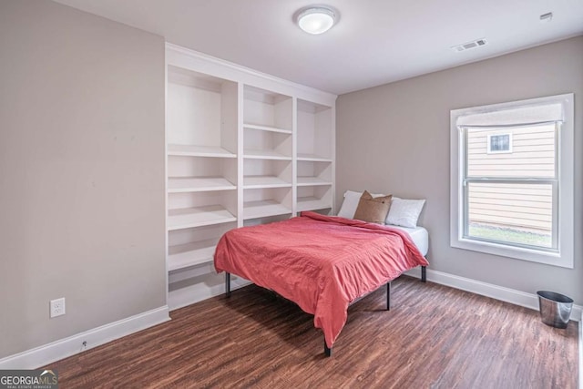 2675 Sugar Mill Dr, Atlanta, GA 30316 - bedroom featuring baseboards, wood finished floors, and visible vents