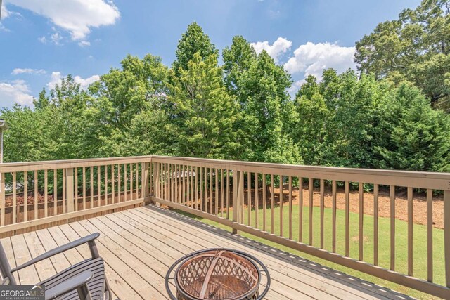 2675 Sugar Mill Dr, Atlanta, GA 30316 - wooden deck with a yard