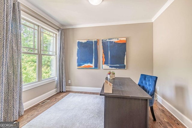 2675 Sugar Mill Dr, Atlanta, GA 30316 - home office with visible vents, baseboards, crown molding, and wood finished floors