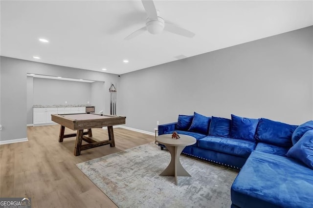 recreation room featuring recessed lighting, light wood finished floors, baseboards, and ceiling fan