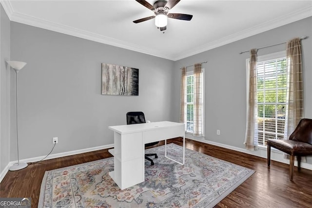 home office with dark wood finished floors, a ceiling fan, baseboards, and crown molding