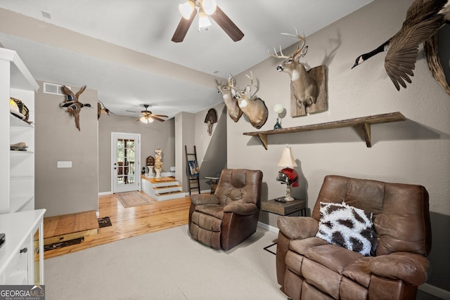 366 Crabapple Rdg, Clarkesville, GA 30523 - living area with a ceiling fan, wood finished floors, stairs, carpet floors, and baseboards