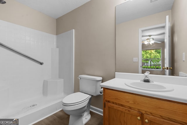 203 Old Pond Dr W, Kingsland, GA 31548 - bathroom with toilet, wood finished floors, a shower, and vanity
