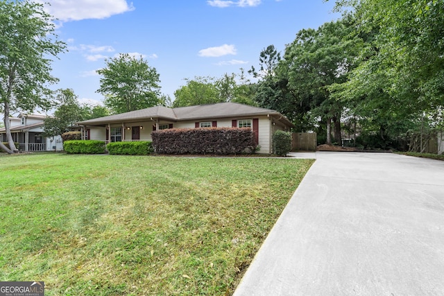 203 Old Pond Dr W, Kingsland, GA 31548 - ranch-style home featuring driveway and a front lawn