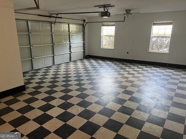 203 Old Pond Dr W, Kingsland, GA 31548 - garage with a garage door opener and baseboards