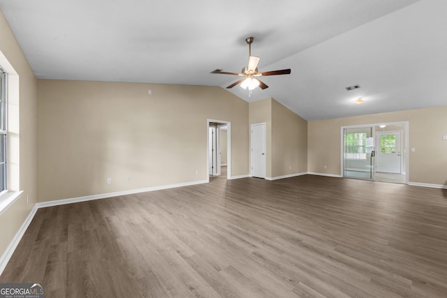 203 Old Pond Dr W, Kingsland, GA 31548 - unfurnished living room featuring a ceiling fan, wood finished floors, lofted ceiling, and baseboards