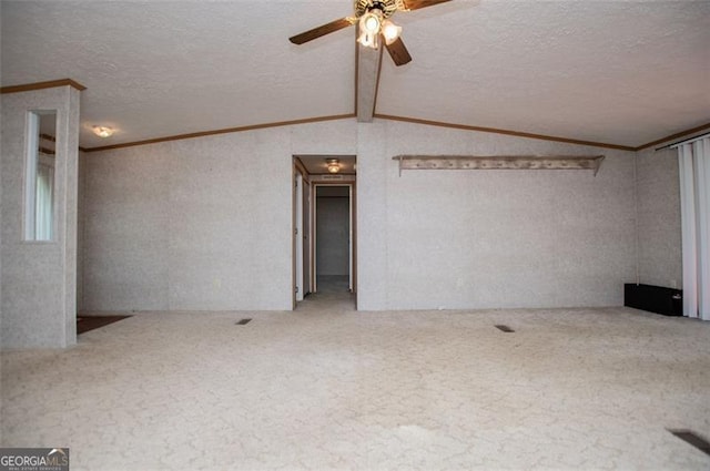1530 Mcbrayer, Temple, GA 30179 - unfurnished room featuring crown molding, a ceiling fan, carpet, lofted ceiling, and a textured ceiling