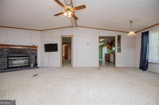1530 Mcbrayer, Temple, GA 30179 - unfurnished living room with a textured ceiling, ceiling fan, vaulted ceiling, crown molding, and carpet floors