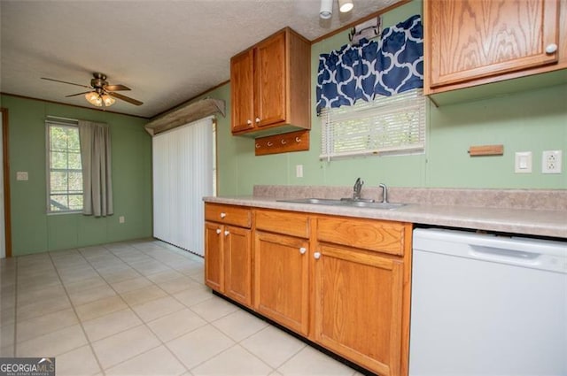 1530 Mcbrayer, Temple, GA 30179 - kitchen with white dishwasher, a sink, ceiling fan, light countertops, and light tile patterned flooring