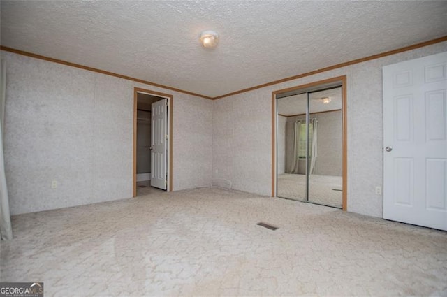 1530 Mcbrayer, Temple, GA 30179 - carpeted empty room featuring crown molding and a textured ceiling