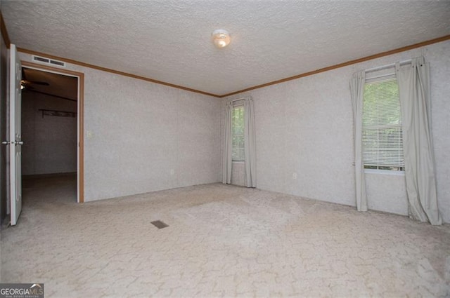 1530 Mcbrayer, Temple, GA 30179 - carpeted spare room with ornamental molding and a textured ceiling