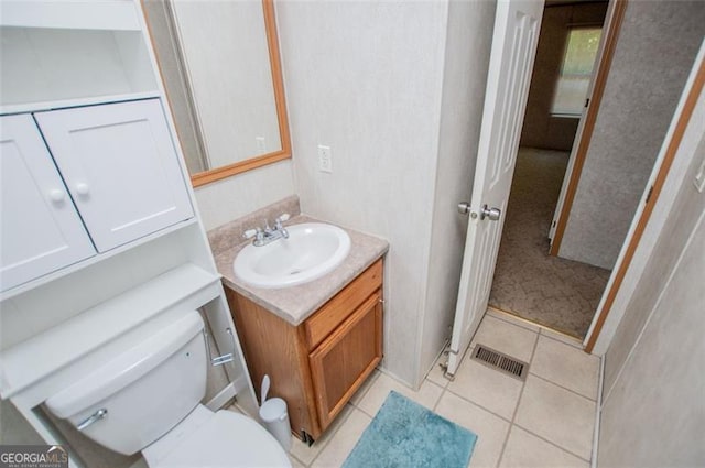 1530 Mcbrayer, Temple, GA 30179 - bathroom featuring vanity, toilet, and tile patterned flooring